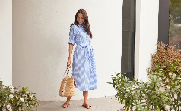 A midi dress typically falls to the knee or mid-calf, offering elegance and comfort. It's ideal for various occasions, showcasing feminine charm and style.